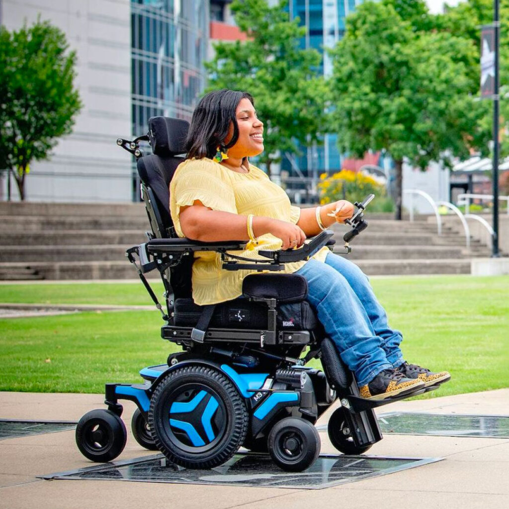 Young woman in power wheelchair