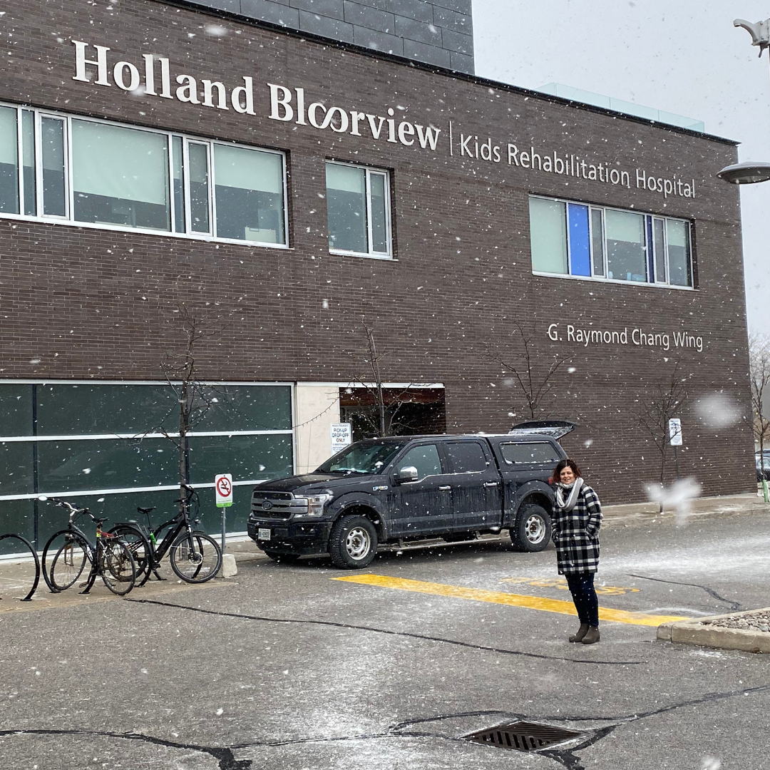 Motion CEO Sue Gilpin pictured outside of the Holland Bloorview Kids Rehab Hospital on a snowy winter day.