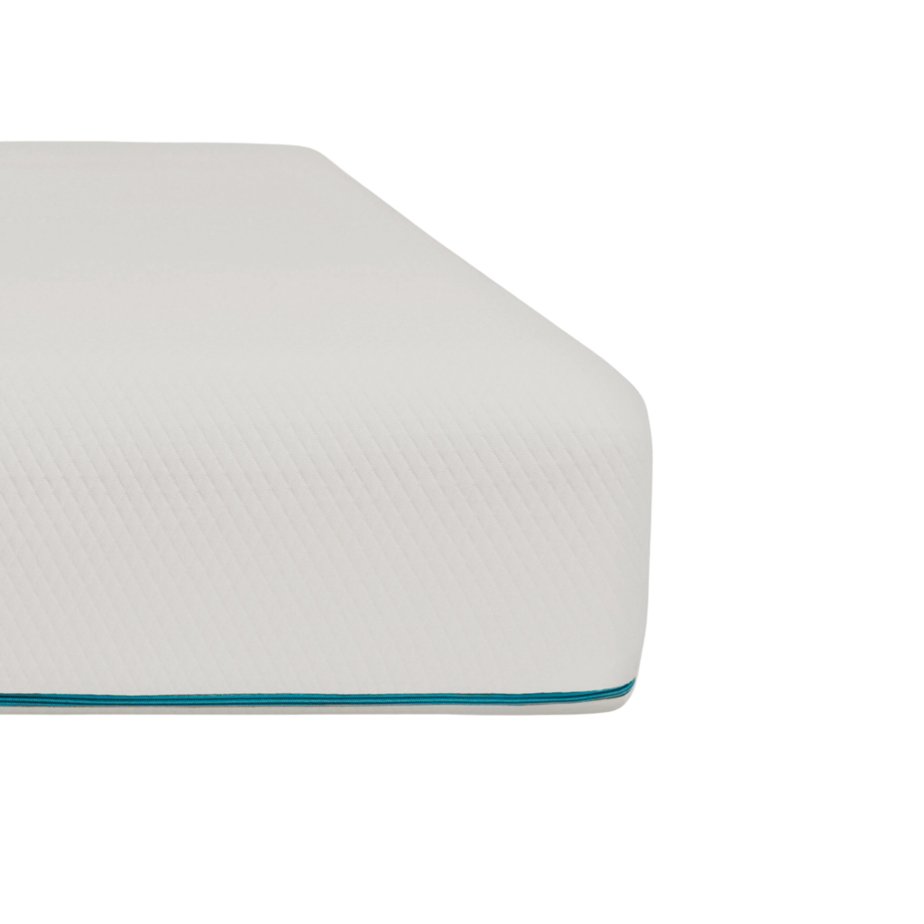 A cropped view of the Sensia Bamboo Mattress with white cover. 