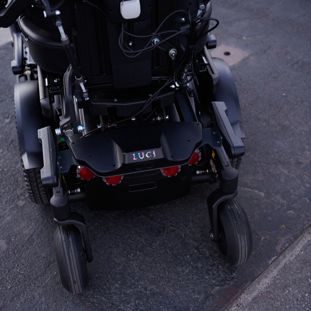 Lauren outside - power wheelchair