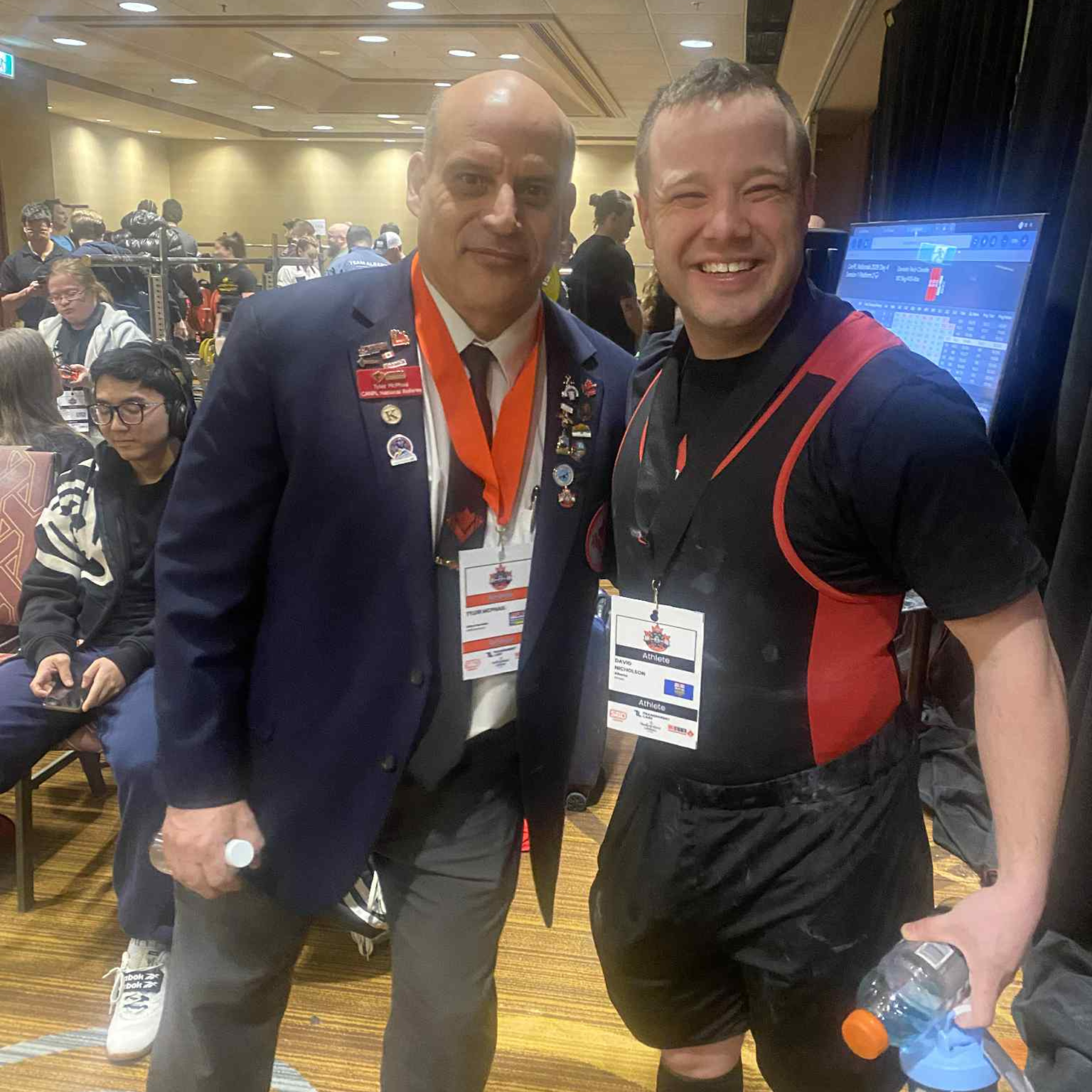 Tyler and a male special Olympian,