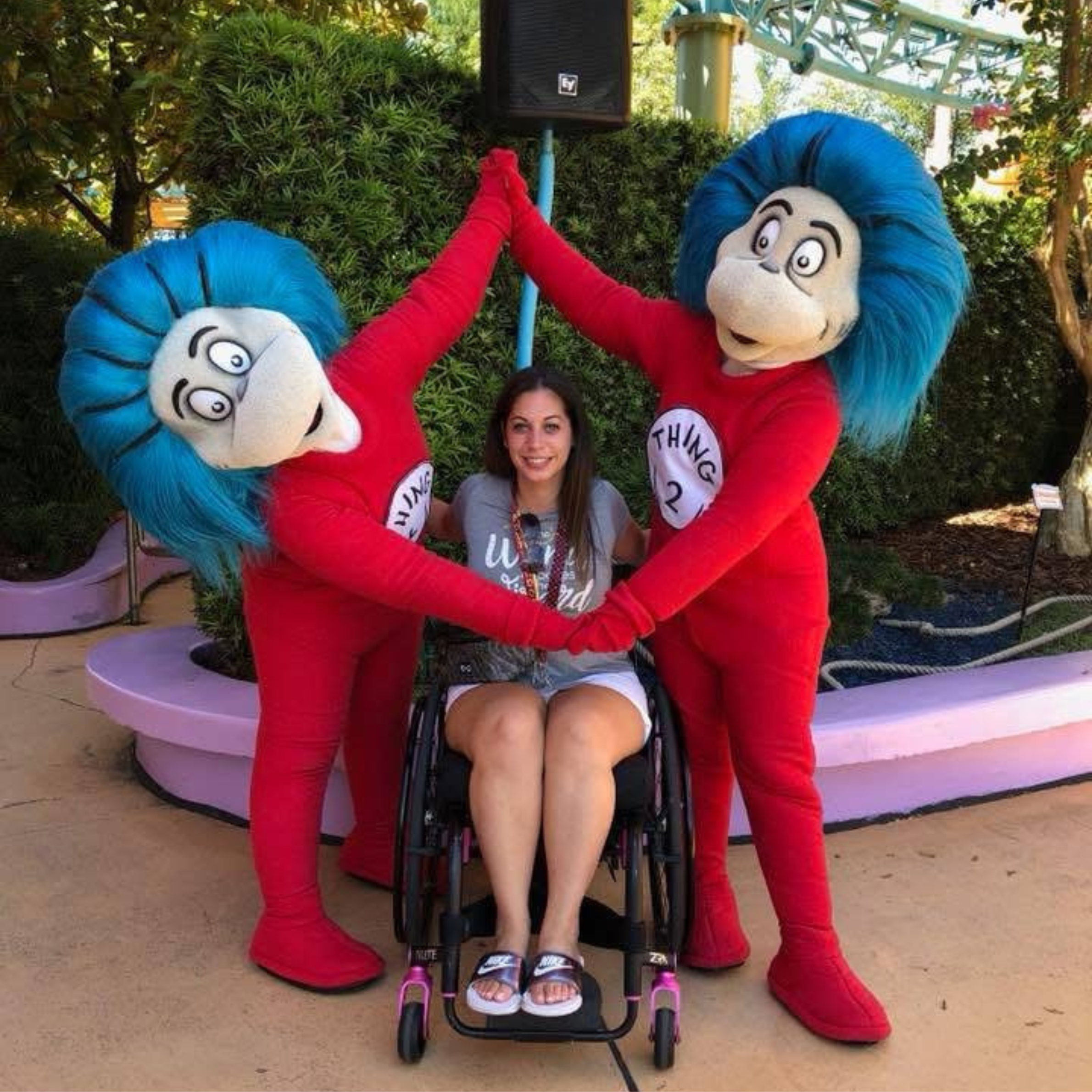 Alicia - Client Ambassador in her wheelchair.