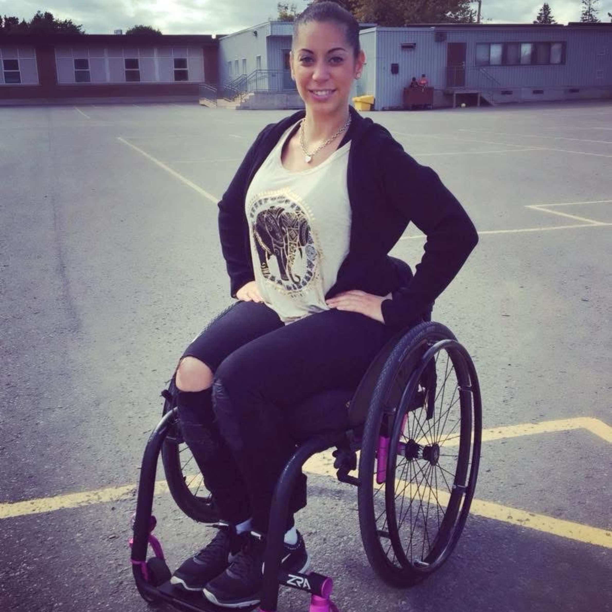 Alicia - Client Ambassador in her wheelchair.