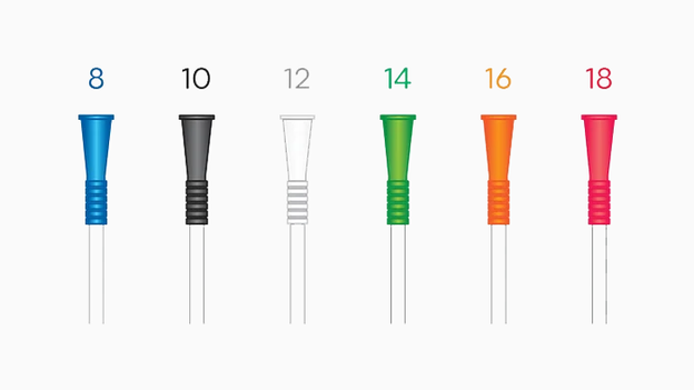 Catheter stoppers in blue, black, white, green, orange and red. 